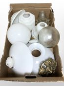 A Scandinavian brass pendant light fixture with opaque conical glass shade and a quantity of opaque