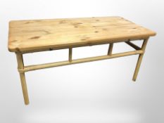 A 20th-century Scandinavian pine and wicker-bound rectangular coffee table,