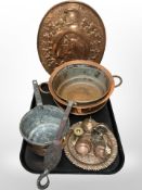A group of antique copper pans, embossed oval plaque, etc.