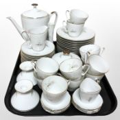 Approximately 45 pieces of German Edelstein tea china and pair of candlesticks.