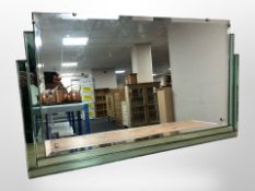 An Art Deco two-tone frameless mirror, 79cm x 46cm.