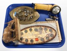 A vintage torch, group of coin rings, Durham Light Infantry enamelled mother of pearl brooch,