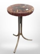A 20th century industrial stool on chrome support