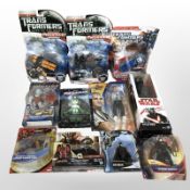 11 Hasbro, Mattel and other figurines to include Star Wars, Transformers, Megaman, etc., boxed.