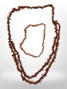 Two coral necklaces.