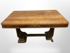 A 20th-century continental oak and pine library table, 132cm long x 85cm wide x 72cm high.