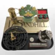 A group of collectibles including painted cast-iron flower basket doorstop,