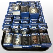 Approximately 40 Star Wars wind-up walking wobbler figurines, boxed.