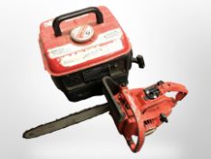 A petrol generator and a chainsaw.