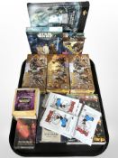 A group of trading cards to include Star Wars, Gormiti, Warhammer, Arcane Legions, Popeye, etc.
