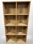A pair of 20th-century Danish blonde oak stackable cube shelves, each 75cm x 70cm x 25cm.