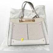 A River Island grey fashion bag, with retail tag and dust cover.