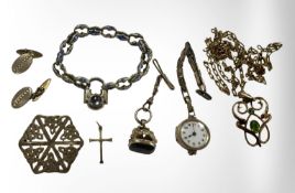 A group of jewellery comprising an Art Nouveau and synthetic green stone pendant, a watch fob,