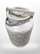 A galvanized milk churn,