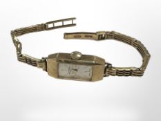 A 9ct yellow gold lady's Rotary wristwatch with full gold strap CONDITION REPORT: 12.