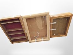 A contemporary glazed display cabinet,