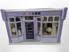 A doll's dress maker's shop marked 