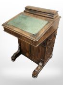 A Victorian walnut Davenport,