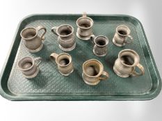 A group of 18th century miniature pewter tankards