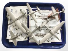 A group of die-cast metal scale model World War II aircraft including Spitfire, Halifax Bomber, etc.