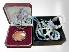 A pink agate brooch, together with a cultured pearl necklace,