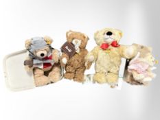 Two Steiff Cosy Friends teddy bears, and two further bears in boxes.