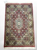 An Iranian hearth rug,