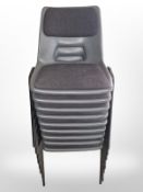 Two sets of stackable chairs