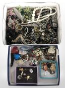 A group of stick pins, lapel badges, Murano art glass pendants, assorted costume jewellery, etc.