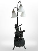 A large Art Nouveau-style composition figural table lamp, with opaque glass shades, height 104cm.