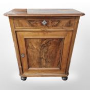 A 19th century continental burr walnut side cabinet,