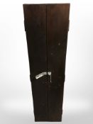A stained wooden single gun cabinet,