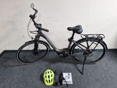A lady's Raleigh Motus electric bike with helmet, charger, battery pack,