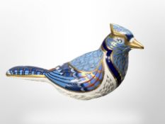 A Royal Crown Derby Blue Jay paperweight with gold stopper, length 17cm.
