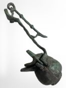 A Greek archaic bronze oil lamp, length 17cm, together with a group of die-cast metal soldiers.