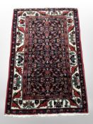 A Feraghan rug, West Iran, 139cm x 89cm.