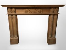 A carved pine fire surround,