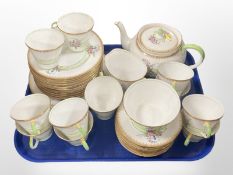 Forty two pieces of Aynsley tea china pattern B3931