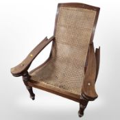 A teak bergere steamer chair,