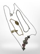 A five-bead pendant on silver chain, a silver double-link bracelet,