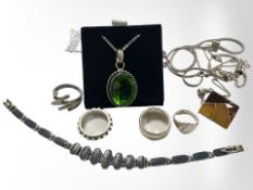 A group of silver jewellery comprising synthetic green stone pendant on chain,