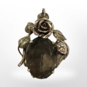 A two-tone 14ct gold and smoky quartz pendant, length 35mm. CONDITION REPORT: 9.2g.