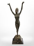 An Art Deco style bronze figure of a female dancer, on marble plinth, height 65cm.