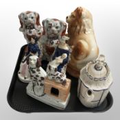 A pair of Victorian Staffordshire dogs, further lion, pair of figures of Victoria and Albert,