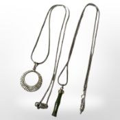 A silver encrusted halo pendant on silver chain,