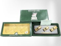 A Lledo British Motoring Classics of the 1960s 24ct gold-plated set of three die-cast vehicles on