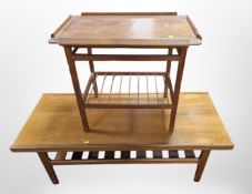 Two 20th century teak two tier occasional tables,