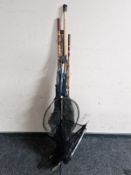 A bundle of two piece fishing rods and landing nets