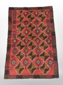 A Baluchi rug, 131cm x 90cm.