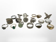 Eighteen dress rings, some examples in sterling silver etc.